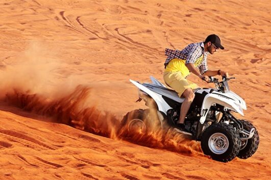 Dubai Morning Quad Bike Tour with Sandboarding and Camel Ride