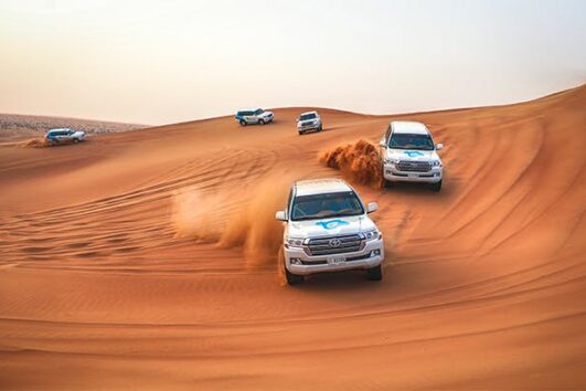 Morning Desert Safari Dubai: Dune Bashing, Sand Boarding, Camel Ride